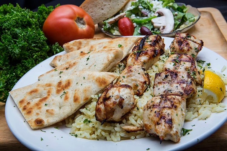 Fazzi's chicken kabobs with rice and pita bread